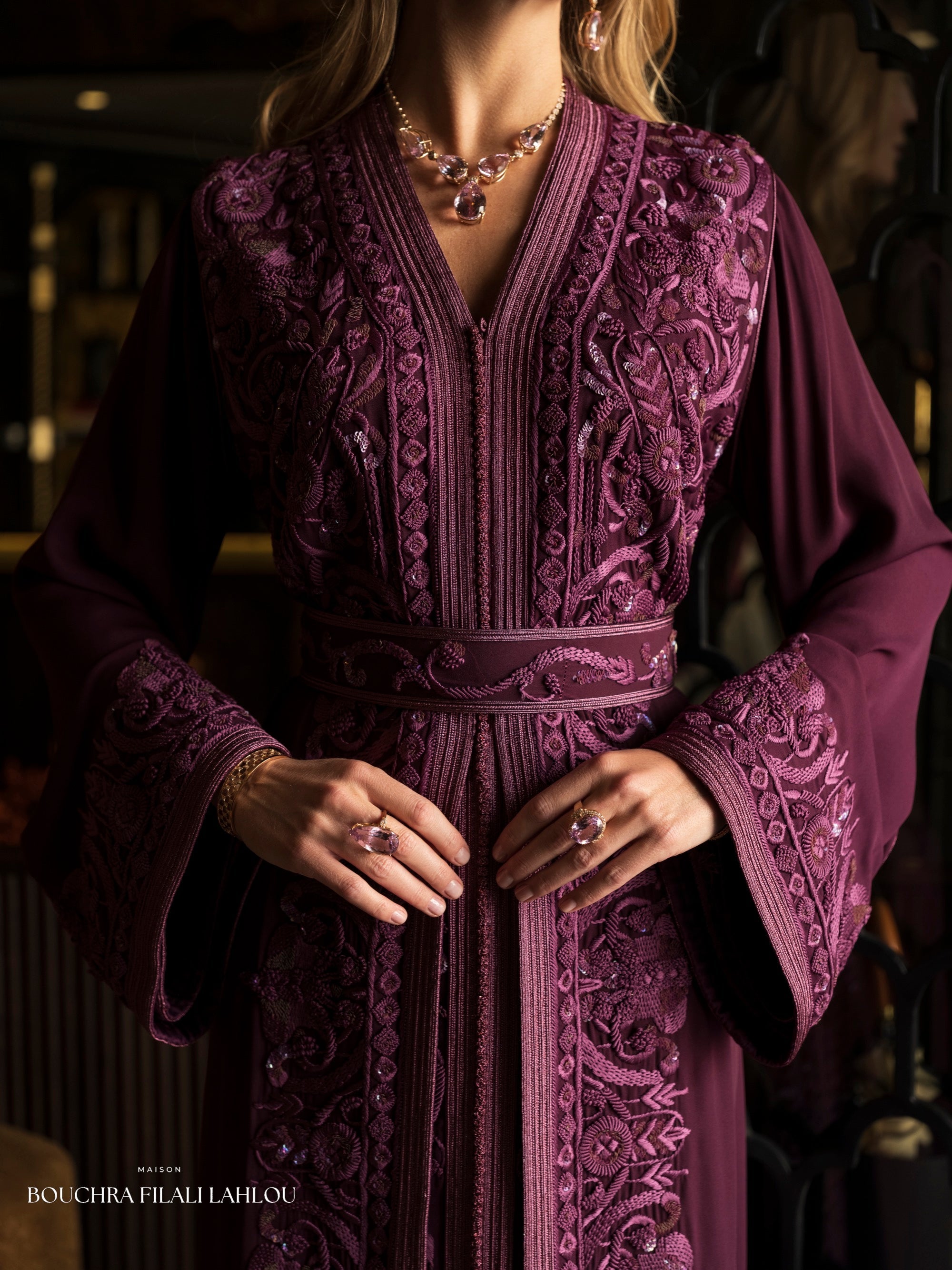 Full length amethyst kaftan silhouette with refined embroidery and formal Moroccan elegance