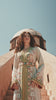 Ecru Tapestry ecru Moroccan kaftan with bands of polychrome beading, in motion